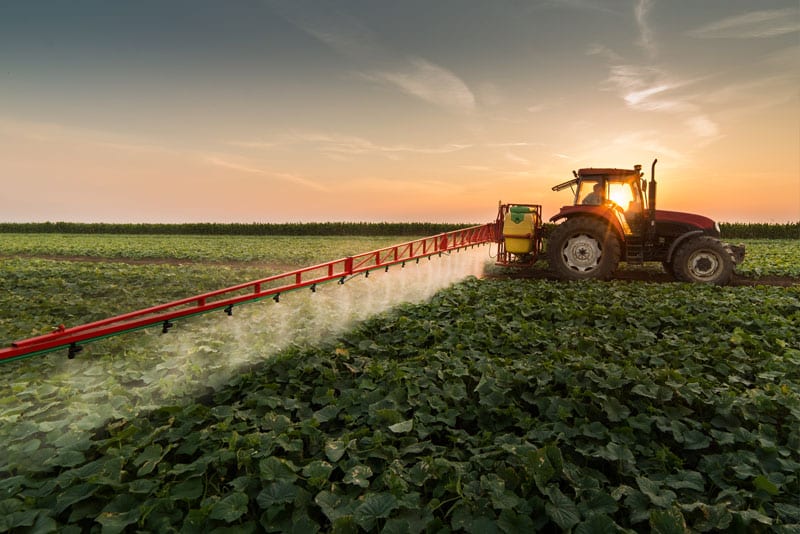 farmer-fertilizing-crops