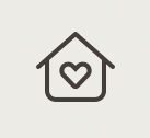 A house featuring a prominent heart shape at its center, symbolizing love and warmth in a home setting.
